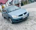 Зелений Міцубісі Lancer, об'ємом двигуна 1.58 л та пробігом 357 тис. км за 2800 $, фото 1 на Automoto.ua