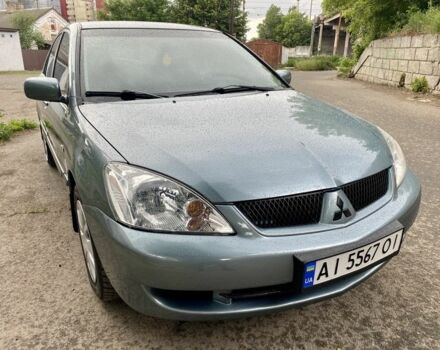 Зелений Міцубісі Lancer, об'ємом двигуна 1.6 л та пробігом 200 тис. км за 4750 $, фото 10 на Automoto.ua