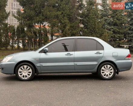 Зеленый Мицубиси Лансер, объемом двигателя 1.6 л и пробегом 214 тыс. км за 4150 $, фото 3 на Automoto.ua