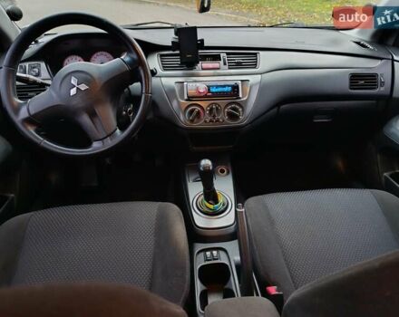 Зелений Міцубісі Lancer, об'ємом двигуна 1.6 л та пробігом 162 тис. км за 4700 $, фото 10 на Automoto.ua