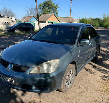 Зелений Міцубісі Lancer, об'ємом двигуна 1.6 л та пробігом 220 тис. км за 3700 $, фото 2 на Automoto.ua