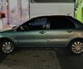 Зелений Міцубісі Lancer, об'ємом двигуна 1.6 л та пробігом 203 тис. км за 3700 $, фото 3 на Automoto.ua