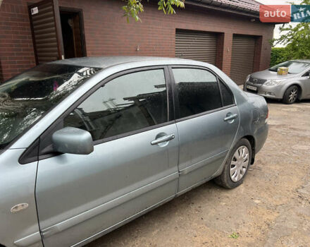 Зелений Міцубісі Lancer, об'ємом двигуна 1.6 л та пробігом 217 тис. км за 5400 $, фото 4 на Automoto.ua