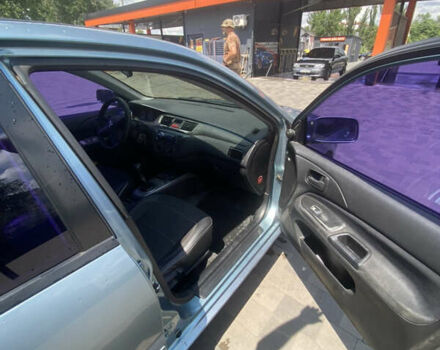 Зелений Міцубісі Lancer, об'ємом двигуна 1.58 л та пробігом 220 тис. км за 4500 $, фото 11 на Automoto.ua