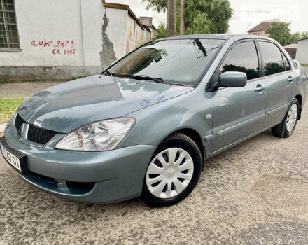 Зелений Міцубісі Lancer, об'ємом двигуна 1.6 л та пробігом 220 тис. км за 4750 $, фото 1 на Automoto.ua