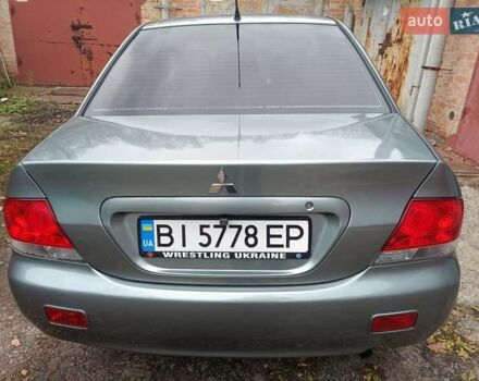 Зелений Міцубісі Lancer, об'ємом двигуна 1.6 л та пробігом 219 тис. км за 4700 $, фото 21 на Automoto.ua