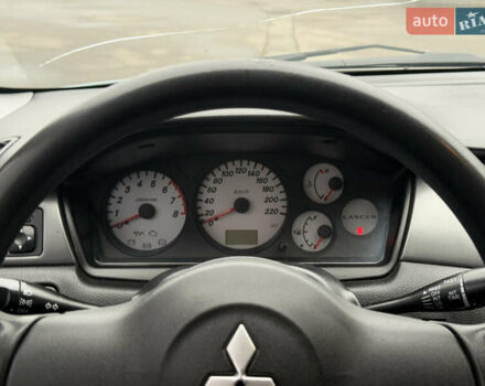 Зеленый Мицубиси Лансер, объемом двигателя 1.6 л и пробегом 214 тыс. км за 4150 $, фото 17 на Automoto.ua