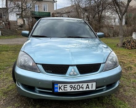Зелений Міцубісі Lancer, об'ємом двигуна 2 л та пробігом 225 тис. км за 5600 $, фото 1 на Automoto.ua