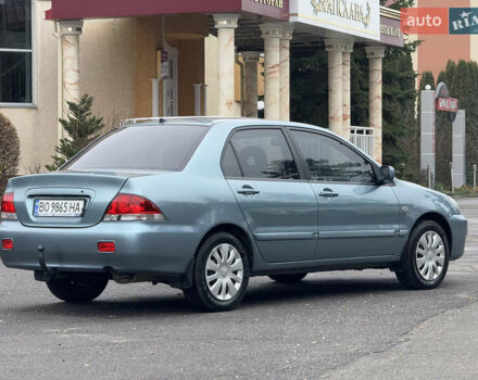 Зеленый Мицубиси Лансер, объемом двигателя 1.6 л и пробегом 214 тыс. км за 4150 $, фото 6 на Automoto.ua