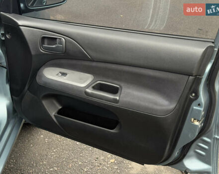 Зеленый Мицубиси Лансер, объемом двигателя 1.6 л и пробегом 214 тыс. км за 4150 $, фото 29 на Automoto.ua