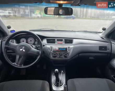 Зеленый Мицубиси Лансер, объемом двигателя 1.6 л и пробегом 164 тыс. км за 5000 $, фото 8 на Automoto.ua