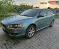 Зеленый Мицубиси Лансер, объемом двигателя 1.5 л и пробегом 220 тыс. км за 4700 $, фото 1 на Automoto.ua