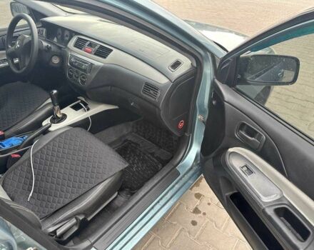 Зеленый Мицубиси Лансер, объемом двигателя 1.6 л и пробегом 300 тыс. км за 3800 $, фото 13 на Automoto.ua