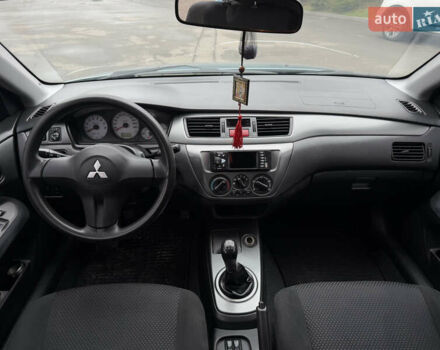 Зеленый Мицубиси Лансер, объемом двигателя 1.6 л и пробегом 214 тыс. км за 4150 $, фото 16 на Automoto.ua