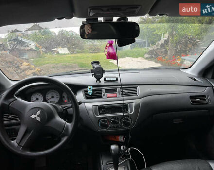 Зелений Міцубісі Lancer, об'ємом двигуна 1.6 л та пробігом 217 тис. км за 5400 $, фото 8 на Automoto.ua