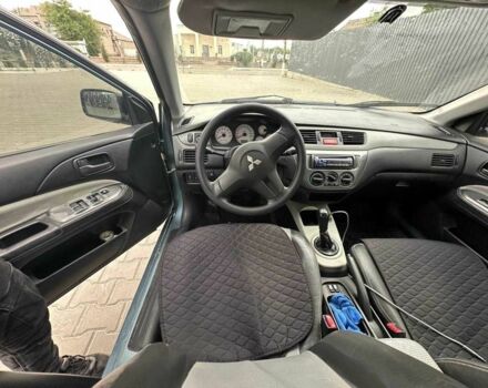 Зеленый Мицубиси Лансер, объемом двигателя 1.6 л и пробегом 300 тыс. км за 3800 $, фото 15 на Automoto.ua