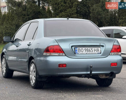 Зеленый Мицубиси Лансер, объемом двигателя 1.6 л и пробегом 214 тыс. км за 4150 $, фото 4 на Automoto.ua