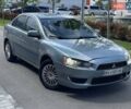 Зеленый Мицубиси Лансер, объемом двигателя 1.5 л и пробегом 272 тыс. км за 5300 $, фото 1 на Automoto.ua