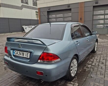 Зеленый Мицубиси Лансер, объемом двигателя 1.6 л и пробегом 165 тыс. км за 5500 $, фото 2 на Automoto.ua