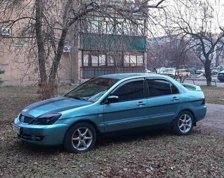 Зелений Міцубісі Lancer, об'ємом двигуна 1.6 л та пробігом 173 тис. км за 6300 $, фото 4 на Automoto.ua