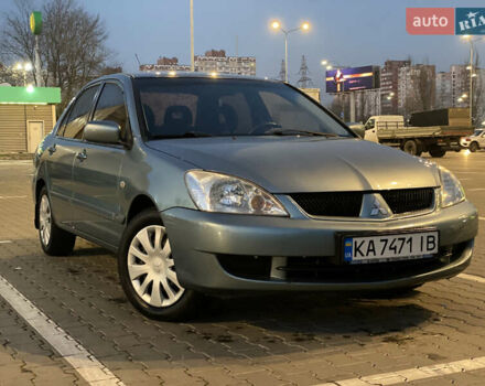 Зелений Міцубісі Lancer, об'ємом двигуна 1.58 л та пробігом 276 тис. км за 3400 $, фото 3 на Automoto.ua