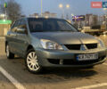 Зелений Міцубісі Lancer, об'ємом двигуна 1.58 л та пробігом 276 тис. км за 3400 $, фото 3 на Automoto.ua