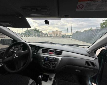 Зеленый Мицубиси Лансер, объемом двигателя 1.6 л и пробегом 300 тыс. км за 3800 $, фото 1 на Automoto.ua