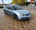 Міцубісі Lancer 2007 у Беляевке на Automoto.ua Зелений Міцубісі Lancer, об'ємом двигуна 2 л та пробігом 238 тис. км за 3400 $, фото 5 на Automoto.ua