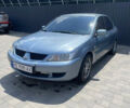 Зелений Міцубісі Lancer, об'ємом двигуна 1.58 л та пробігом 220 тис. км за 4500 $, фото 1 на Automoto.ua