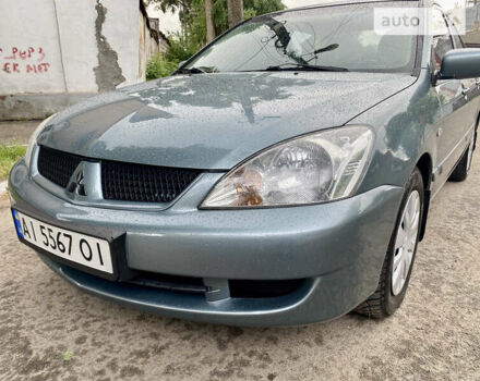 Зелений Міцубісі Lancer, об'ємом двигуна 1.6 л та пробігом 220 тис. км за 4750 $, фото 25 на Automoto.ua