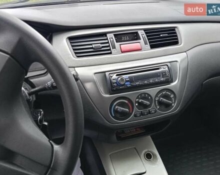 Зеленый Мицубиси Лансер, объемом двигателя 1.58 л и пробегом 300 тыс. км за 3999 $, фото 8 на Automoto.ua