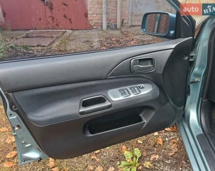 Зелений Міцубісі Lancer, об'ємом двигуна 1.6 л та пробігом 219 тис. км за 4700 $, фото 15 на Automoto.ua