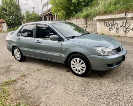 Зелений Міцубісі Lancer, об'ємом двигуна 1.6 л та пробігом 200 тис. км за 4750 $, фото 9 на Automoto.ua