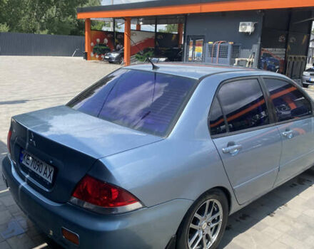 Зелений Міцубісі Lancer, об'ємом двигуна 1.58 л та пробігом 220 тис. км за 4500 $, фото 4 на Automoto.ua