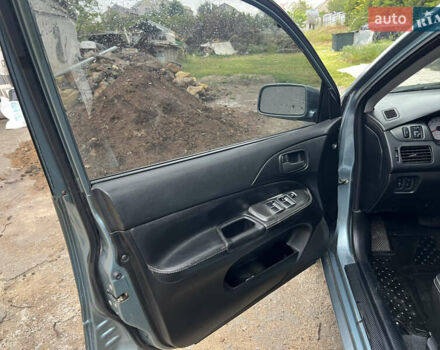 Зелений Міцубісі Lancer, об'ємом двигуна 1.6 л та пробігом 217 тис. км за 5400 $, фото 9 на Automoto.ua