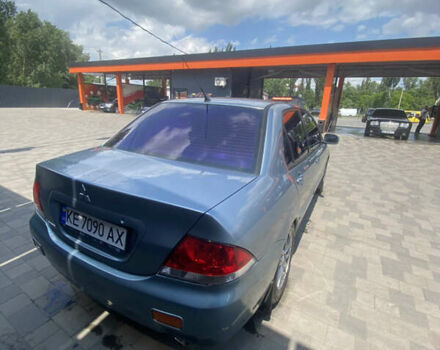 Зелений Міцубісі Lancer, об'ємом двигуна 1.58 л та пробігом 220 тис. км за 4500 $, фото 6 на Automoto.ua