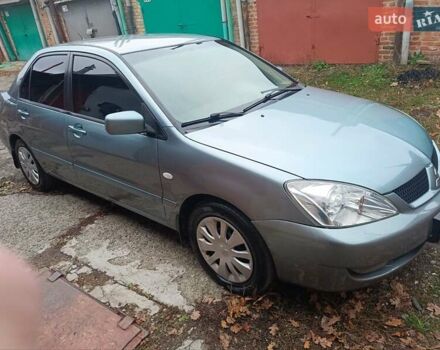 Зелений Міцубісі Lancer, об'ємом двигуна 1.6 л та пробігом 219 тис. км за 4700 $, фото 19 на Automoto.ua