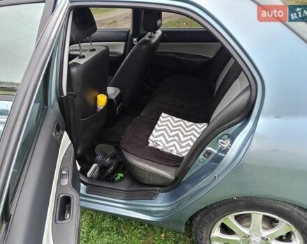 Зеленый Мицубиси Лансер, объемом двигателя 1.58 л и пробегом 300 тыс. км за 3999 $, фото 4 на Automoto.ua