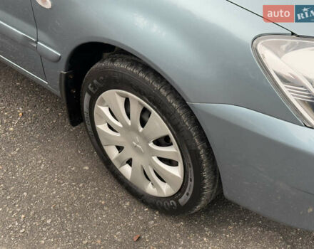 Зеленый Мицубиси Лансер, объемом двигателя 1.6 л и пробегом 214 тыс. км за 4150 $, фото 9 на Automoto.ua