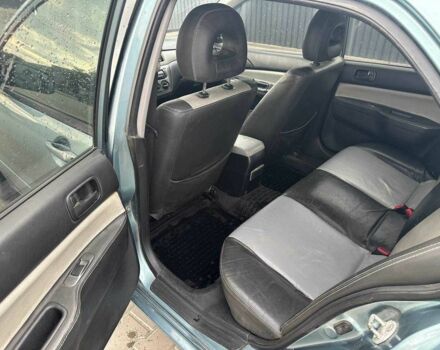 Зеленый Мицубиси Лансер, объемом двигателя 1.6 л и пробегом 300 тыс. км за 3800 $, фото 11 на Automoto.ua