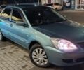 Зелений Міцубісі Lancer, об'ємом двигуна 1.6 л та пробігом 203 тис. км за 3700 $, фото 1 на Automoto.ua
