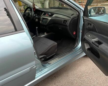 Зеленый Мицубиси Лансер, объемом двигателя 1.6 л и пробегом 255 тыс. км за 4000 $, фото 2 на Automoto.ua