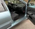 Зеленый Мицубиси Лансер, объемом двигателя 1.6 л и пробегом 255 тыс. км за 4000 $, фото 2 на Automoto.ua