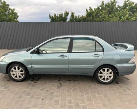 Зеленый Мицубиси Лансер, объемом двигателя 1.6 л и пробегом 300 тыс. км за 3800 $, фото 5 на Automoto.ua