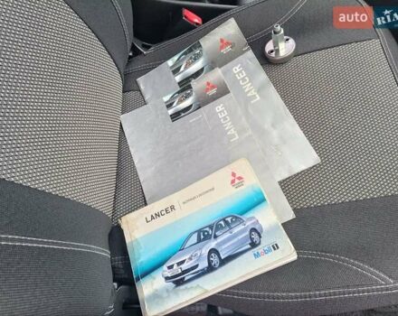 Зеленый Мицубиси Лансер, объемом двигателя 1.6 л и пробегом 219 тыс. км за 5300 $, фото 24 на Automoto.ua