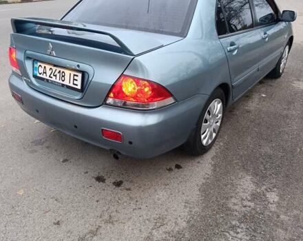 Зелений Міцубісі Lancer, об'ємом двигуна 1.6 л та пробігом 162 тис. км за 4700 $, фото 6 на Automoto.ua