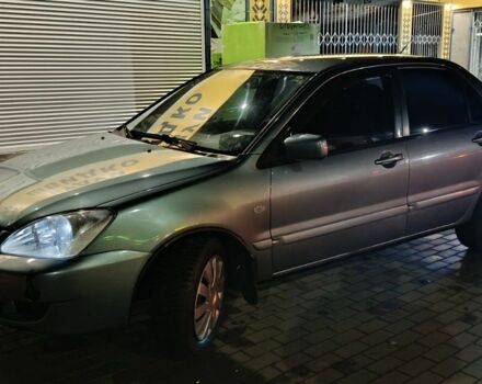 Зелений Міцубісі Lancer, об'ємом двигуна 1.6 л та пробігом 203 тис. км за 3700 $, фото 1 на Automoto.ua