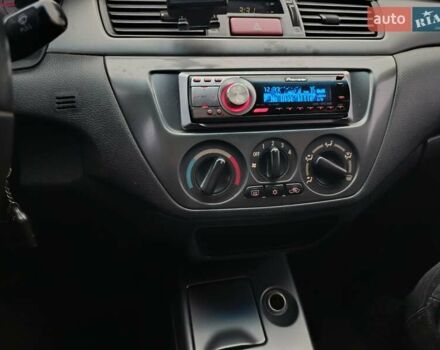 Зелений Міцубісі Lancer, об'ємом двигуна 1.6 л та пробігом 162 тис. км за 4700 $, фото 15 на Automoto.ua