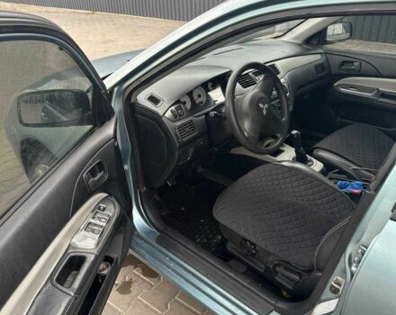 Зеленый Мицубиси Лансер, объемом двигателя 1.6 л и пробегом 300 тыс. км за 3800 $, фото 16 на Automoto.ua