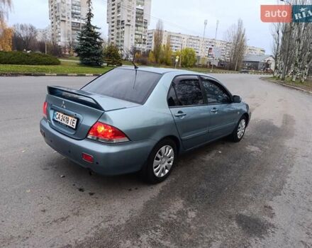 Зелений Міцубісі Lancer, об'ємом двигуна 1.6 л та пробігом 162 тис. км за 4700 $, фото 1 на Automoto.ua